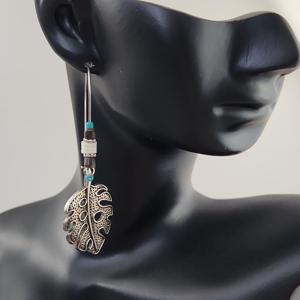 Boho style earrings with leaf pendant